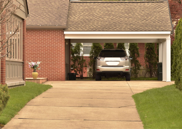 Comparing the pros and cons of building a carport vs. garage