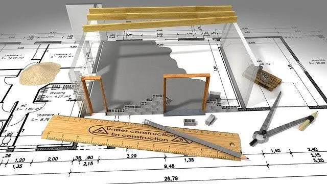 Wooden ruler engraved with under construction used for measuring in plot plans and site plan preparation