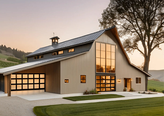 Modern beige metal barndominium with dark gray roof and large glass windows illustrating barndominium floor plans.