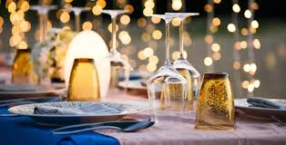 elegant white tablecloths on banquet tables with dried floral centerpieces enhance site plan event planning ambiance